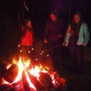 Toasting marshmallows on the bonfire