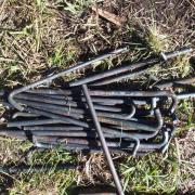 Tent pegs after formed in the campfire